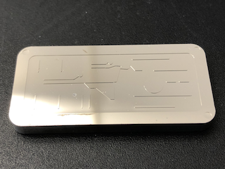 2-level microfluidic mold-insert with massive Ni-backplate